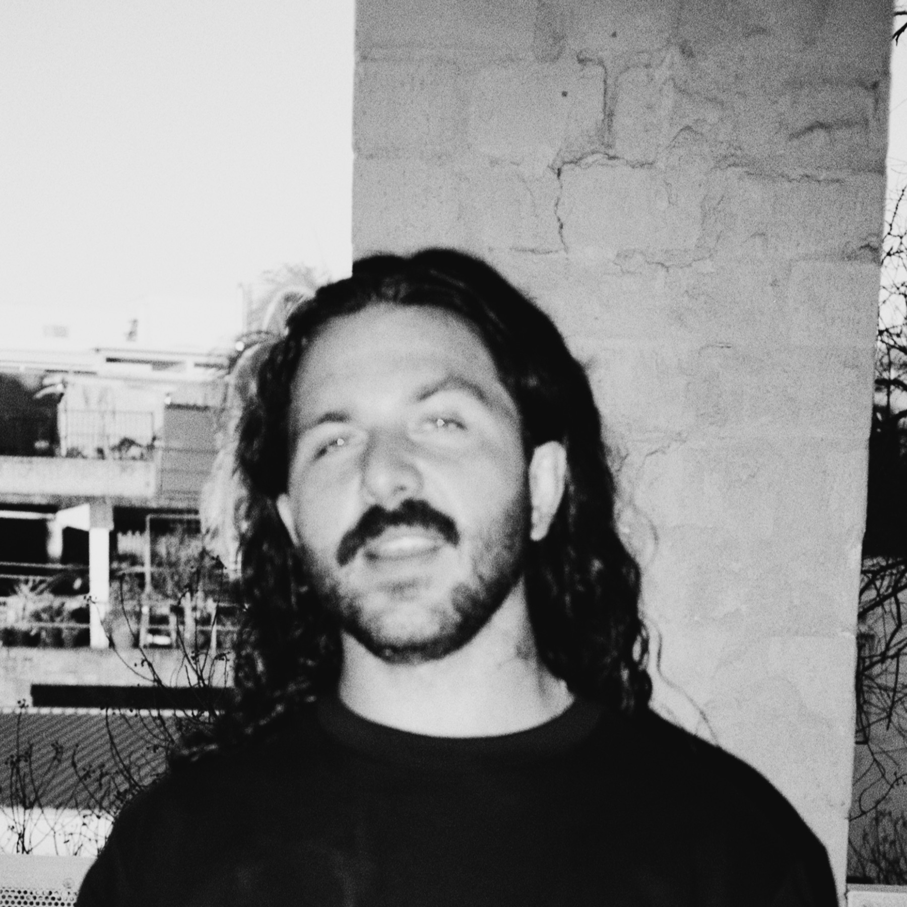 Black and white portrait of Alex Weybury
